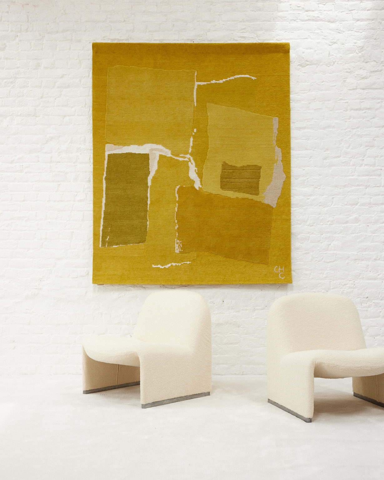 Pair of "Alky" Lounge chairs by Giancarlo Piretti